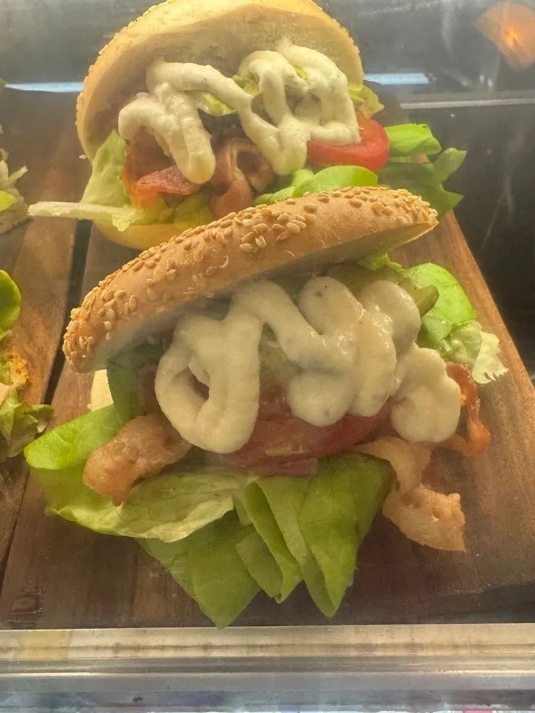 Stacked sandwiches with fresh lettuce in the cabinet